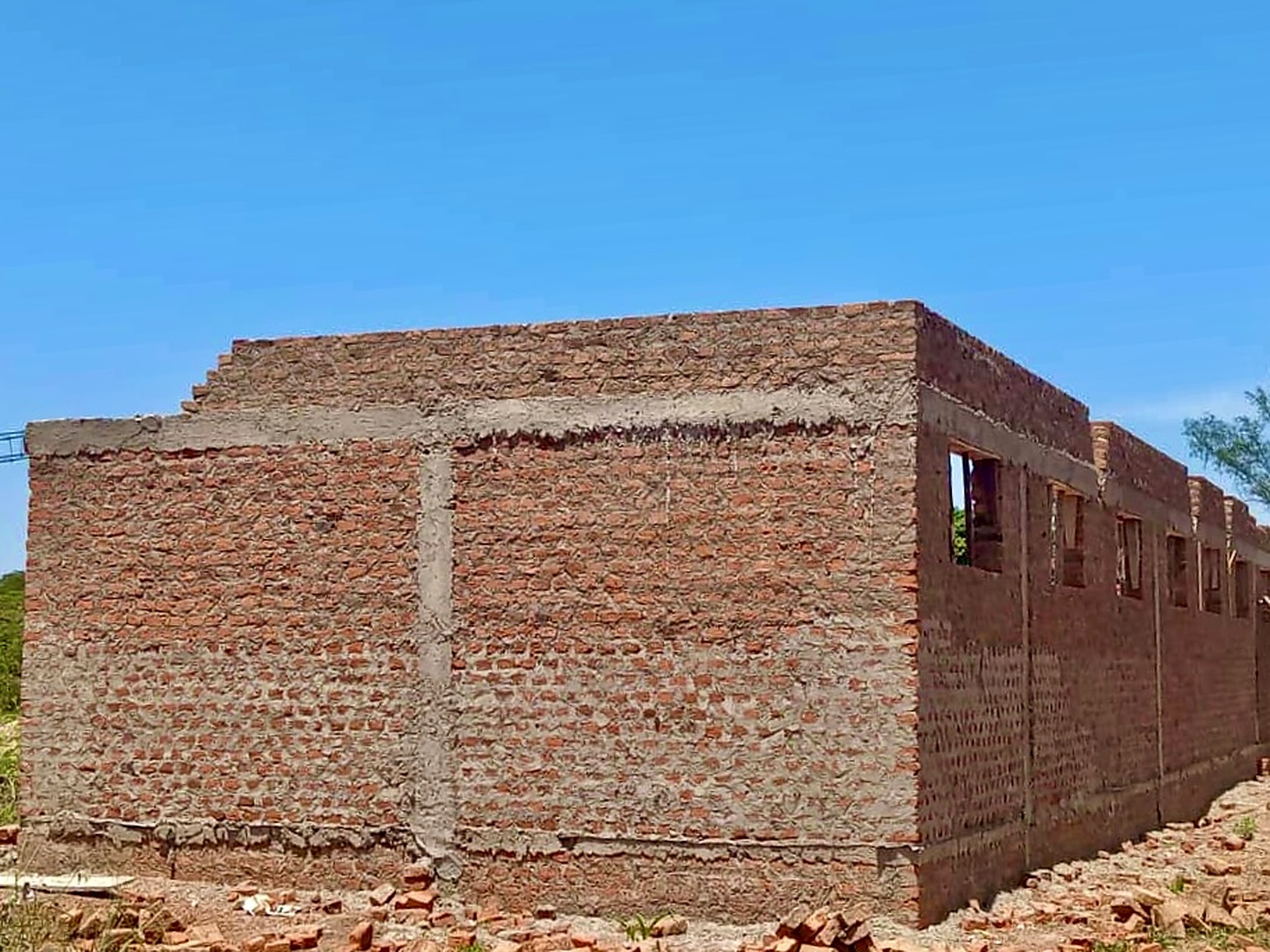 The dormitory walls rising at Adesso Primary School, Kumi