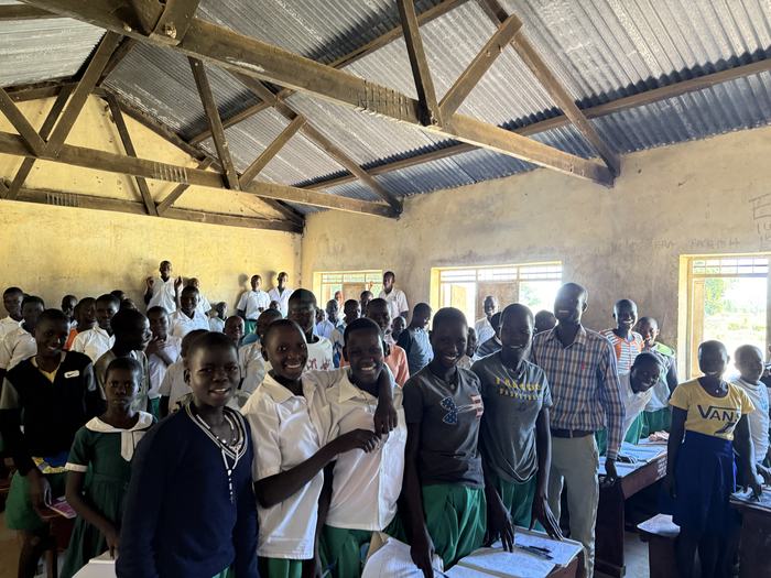 A full classroom of smiling students