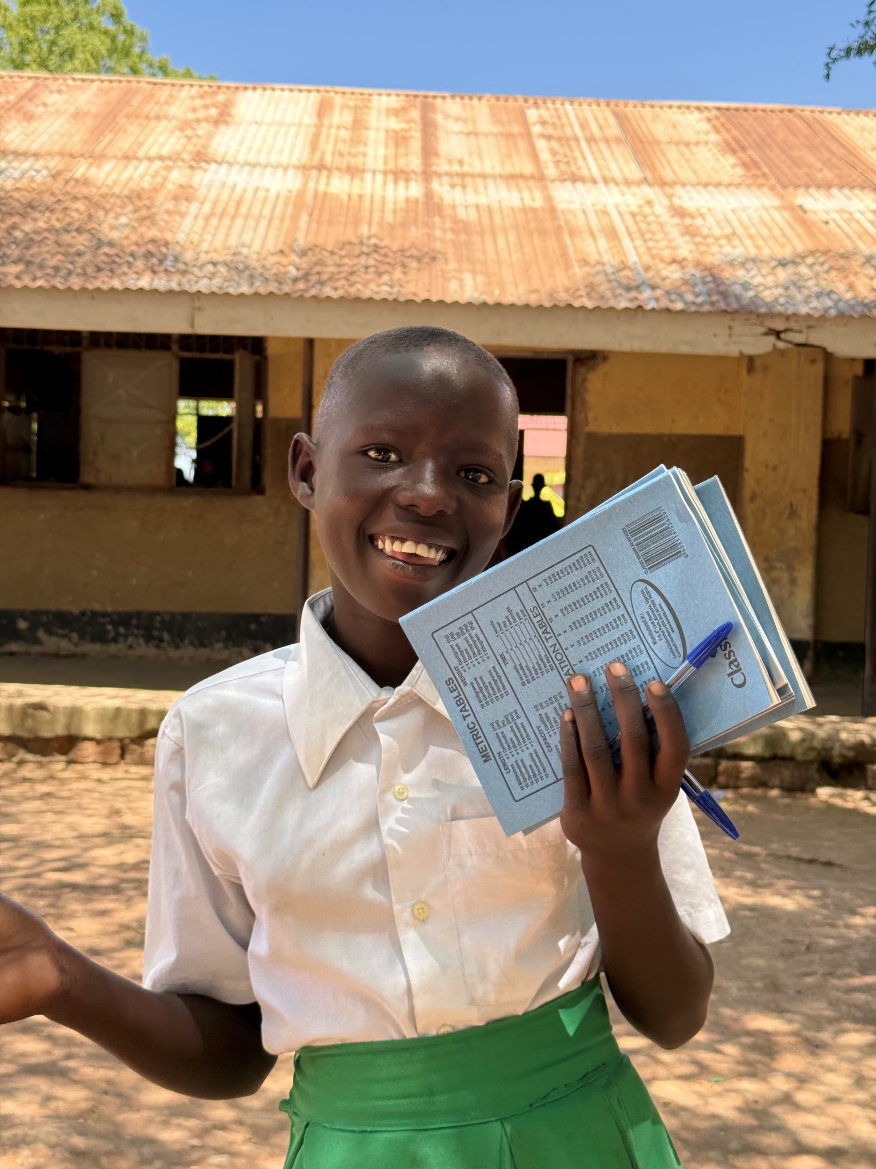 Children with new books and supplies